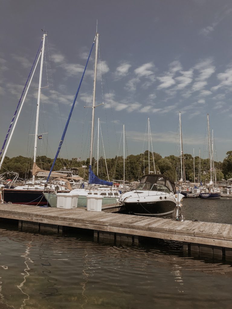 sailboats at a marina in door county, egg harbor, boats on lake michigan