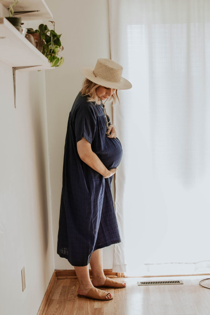 blue maxi dress, straw hat, pregnancy style