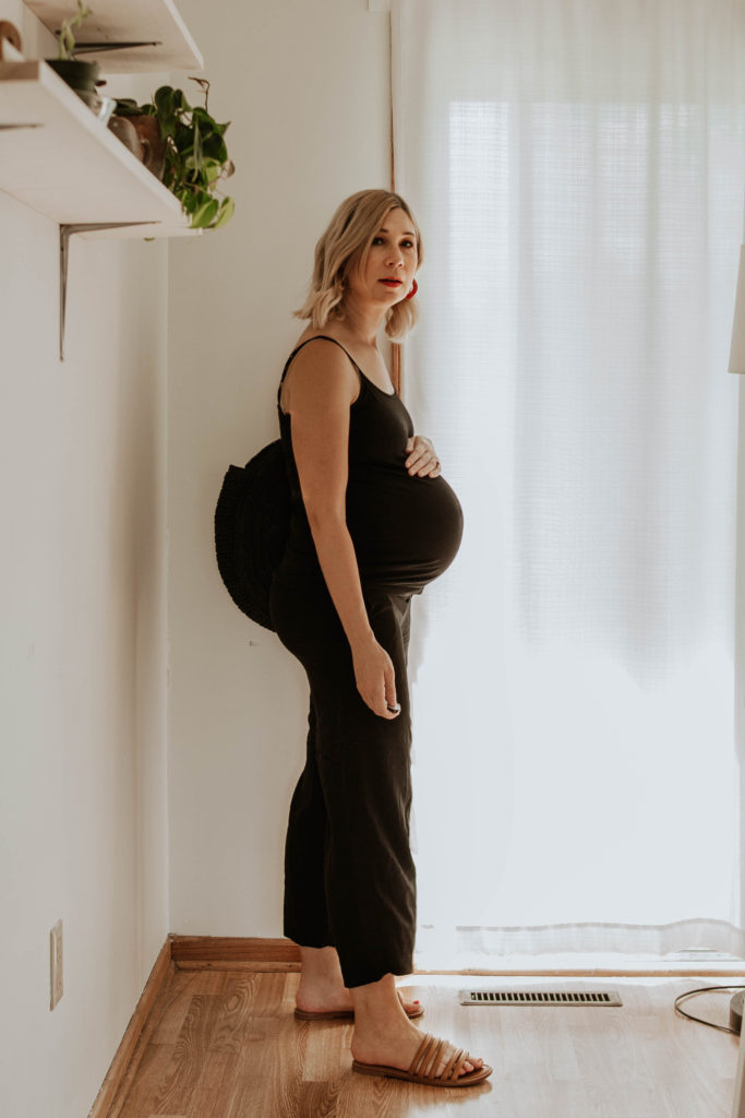 dressing for comfort, all black maternity outfit, black and brown outfit, black wide leg pants