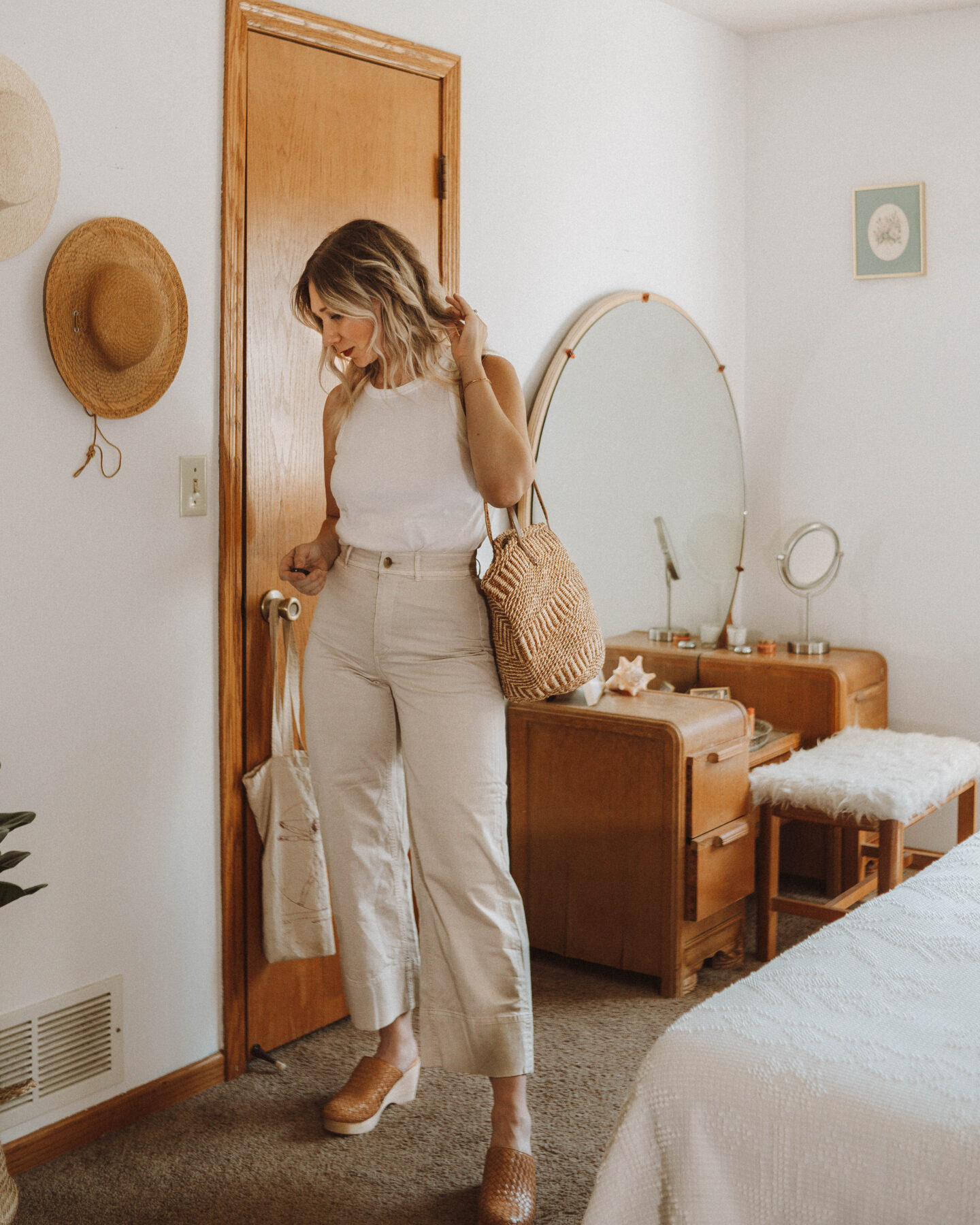 How to Style Wide Leg Pants + 6 Outfit Ideas, everlane lightweight wide leg crop chino, cut out tank, everlane woven clogs, vintage straw bag