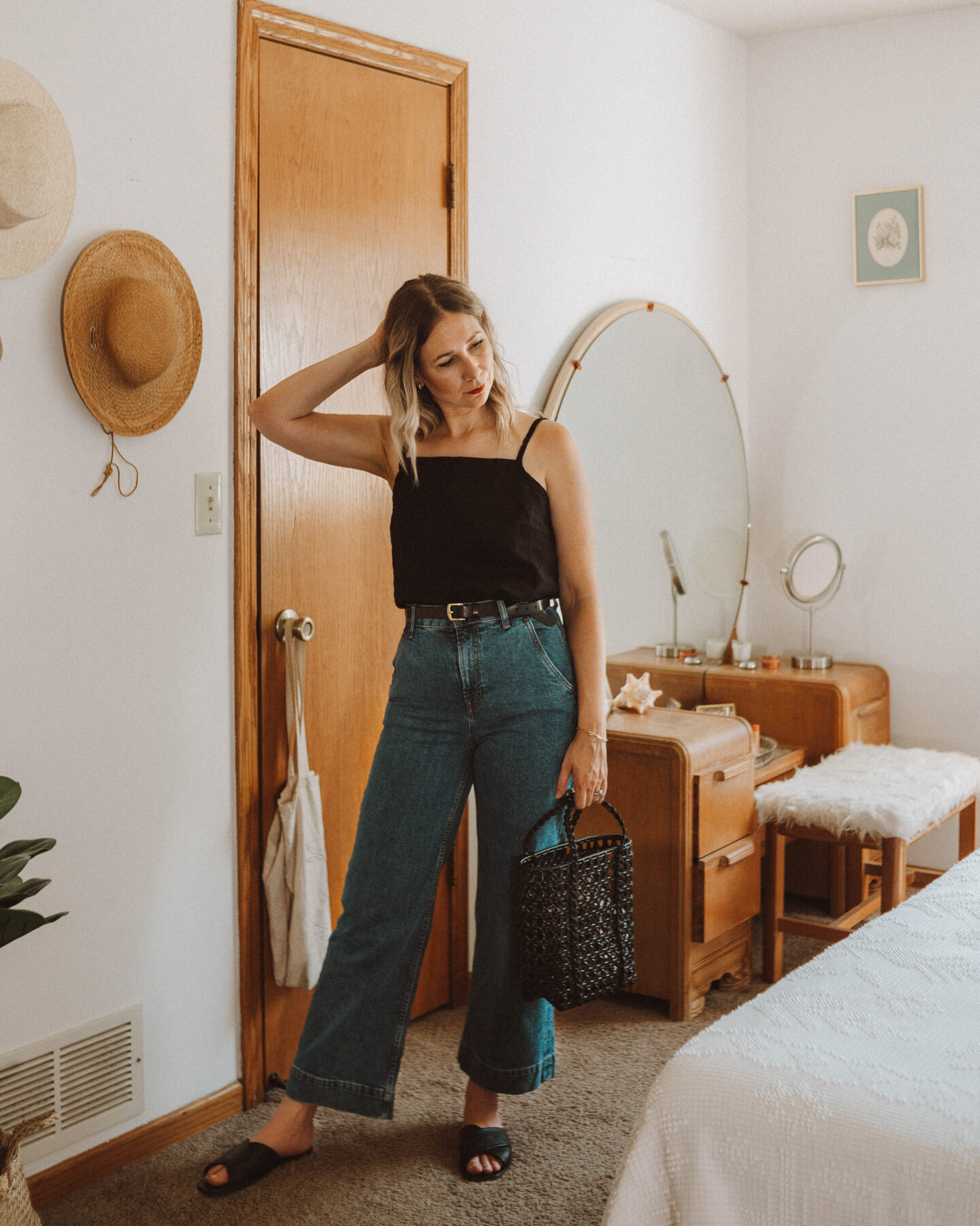 How to Style Wide Leg Pants + 6 Outfit Ideas, everlane wide leg jeans, linenfox black linen cami, everlane crossover sandal, bembien jolene mini black