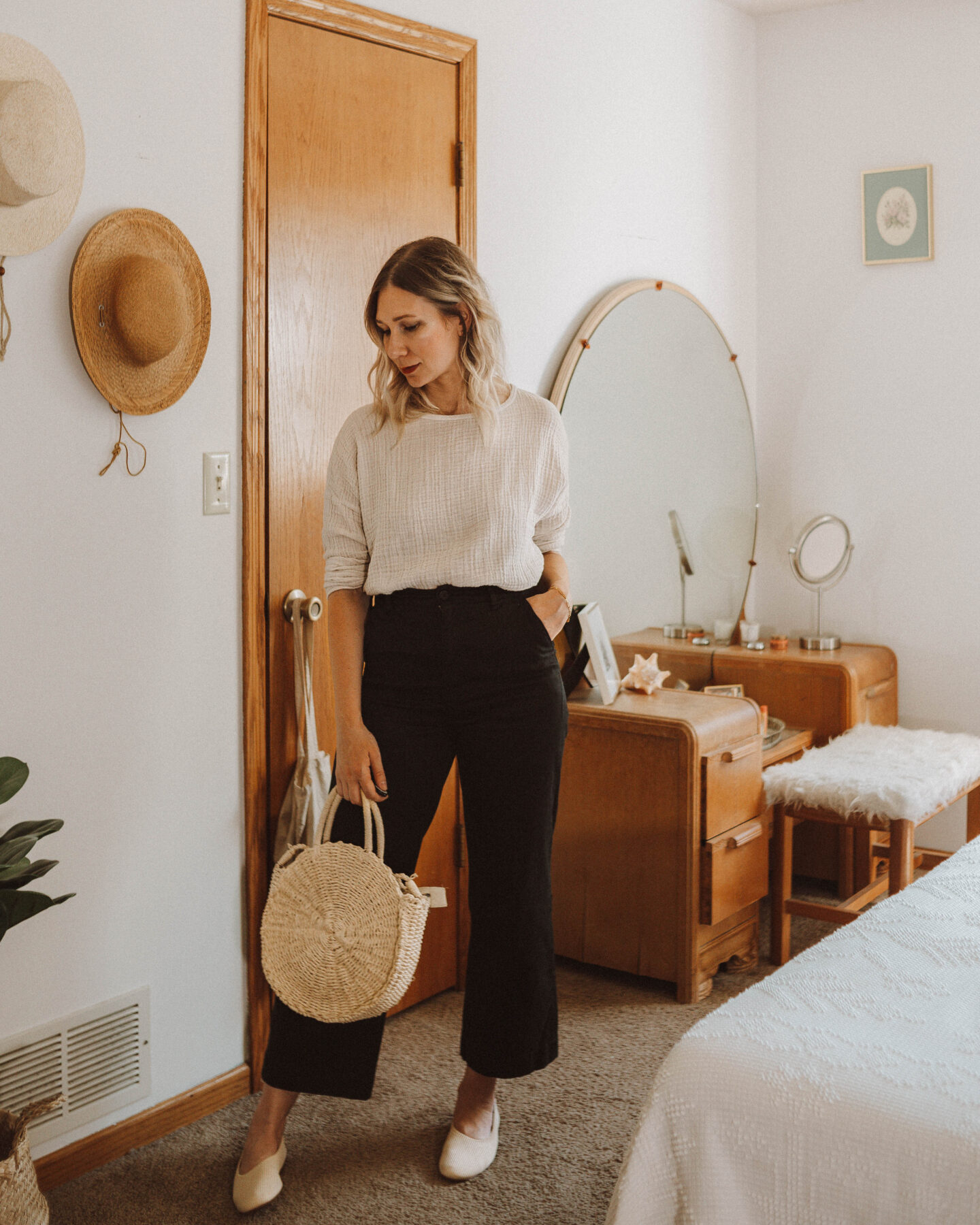 How to Style Wide Leg Pants + 6 Outfit Ideas, it is well la gauze long sleeve top, black kotn cropped culotte pants, everlane reknit day glove shoe, straw circle bag