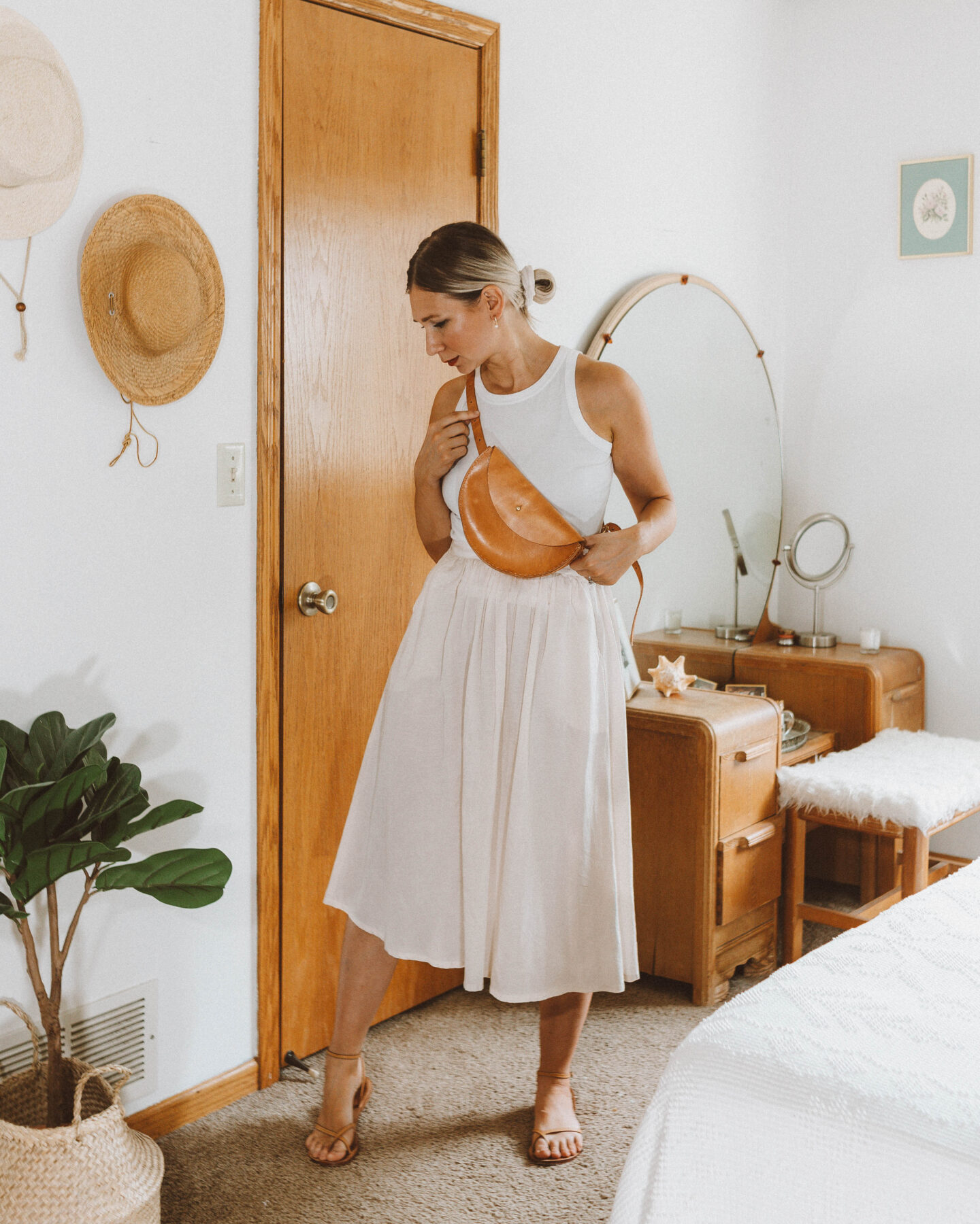 A Week of Summer Outfit Ideas: all white outfit, everlane cutaway tank review, it is well la skirt review, nude strappy sandals, tree fairfax extended half moon review